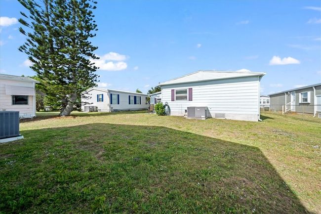 641 Hyacinth Cir, House other with 2 bedrooms, 2 bathrooms and null parking in Barefoot Bay FL | Image 23