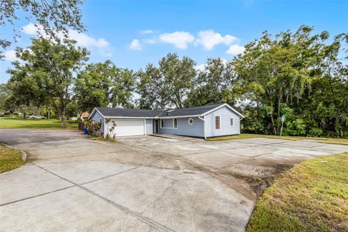 697 E Anderson Rd, GROVELAND, FL, 34736-2900 | Card Image