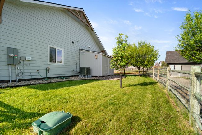 View of yard featuring central AC unit | Image 31