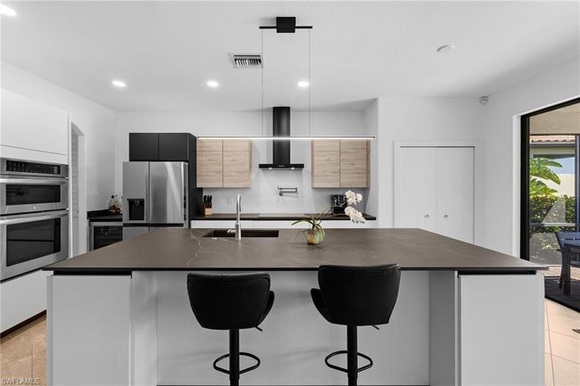 4764 Formosa Dr, House other with 5 bedrooms, 3 bathrooms and 3 parking in NAPLES FL | Image 27