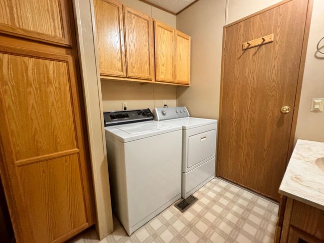 Laundry built into the bathroom | Image 11