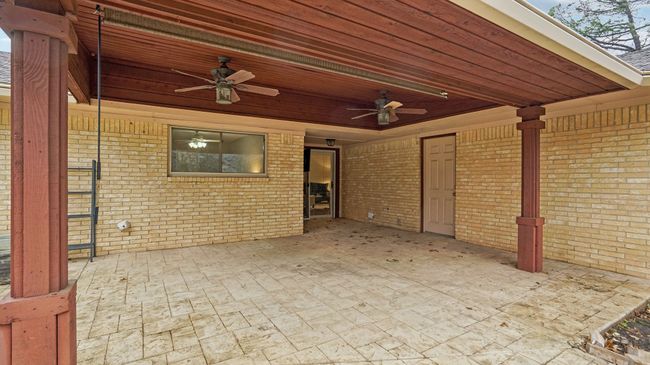 View of patio / terrace with ceiling fan | Image 32