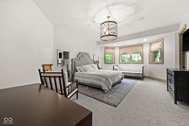 Lower Level Sixth bedroom with carpet floors, a chandelier, recessed lighting | Image 71
