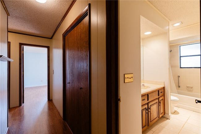 entrance to guest bath | Image 33