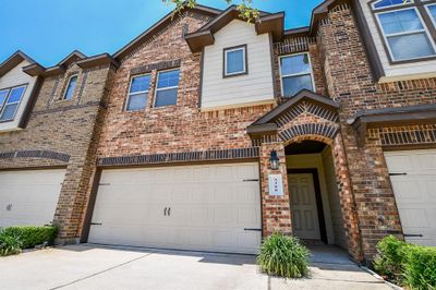 Condo features three bedrooms, two car garage and great storage | Image 2