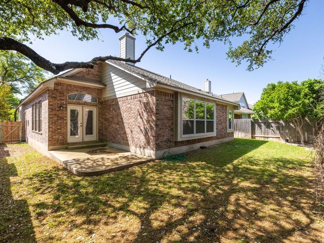 Back concrete patio is large enough to host family meals. | Image 18