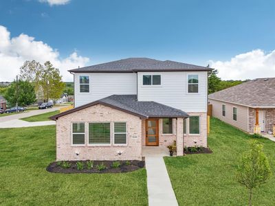 View of front of home with a front lawn | Image 1