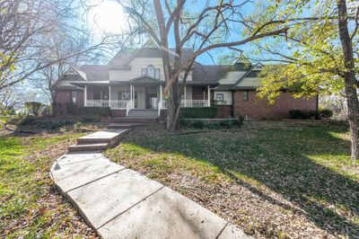 View of front of house featuring a porch and a front lawn | Image 2