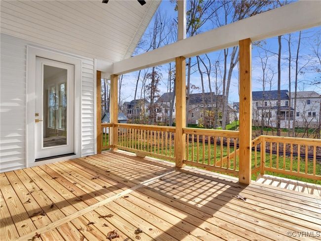 Photo represents the plan, not the actual home. Design selections may vary. A deck perfect for relaxing evenings. | Image 17