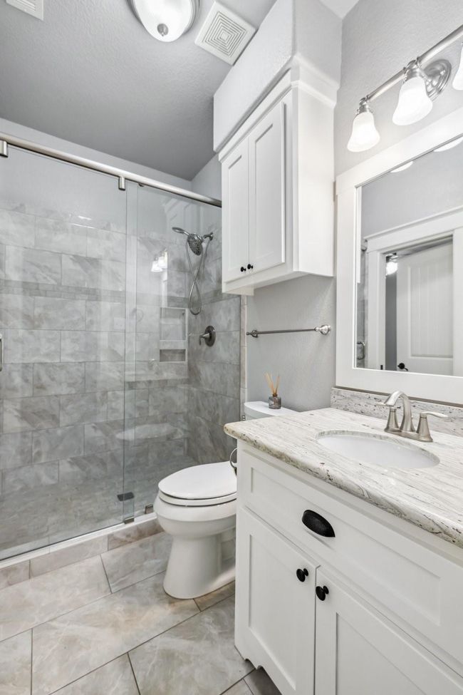 Full bathroom downstairs. Nice walk in shower as well | Image 21