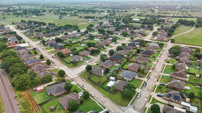 View of property location with nearby suburban area | Image 40