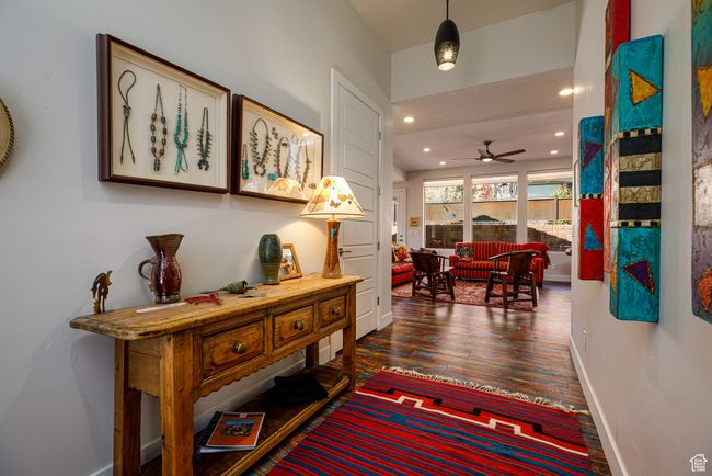 Hall with dark wood-style floors, baseboards, and recessed lighting | Image 6
