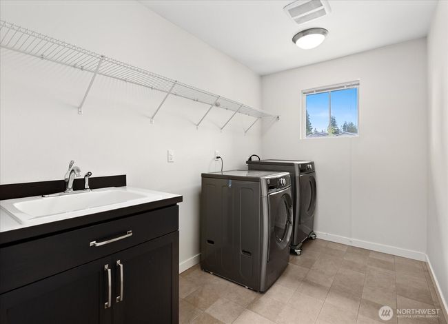 Convenient upstairs laundry room | Image 31