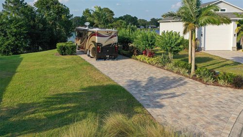 706 Meandering Way, POLK CITY, FL, 33868-5170 | Card Image