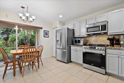 7120 Hawks Nest Terrace, Townhouse with 4 bedrooms, 2 bathrooms and null parking in Riviera Beach FL | Image 3