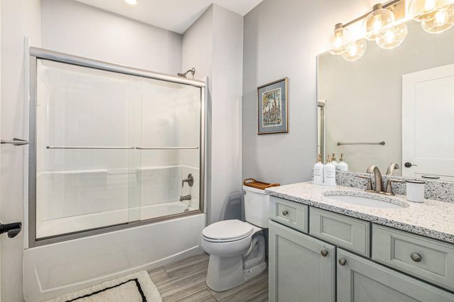 Main bath with tile and quartz counters | Image 30