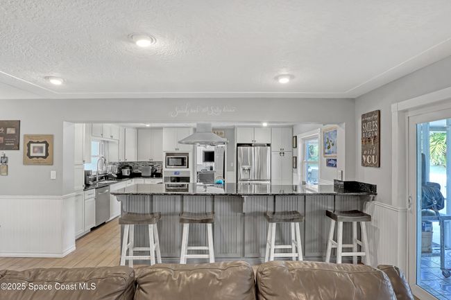 1061 Bali Rd, House other with 4 bedrooms, 2 bathrooms and null parking in Cocoa Beach FL | Image 13