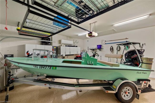 Garage featuring a garage door opener | Image 31
