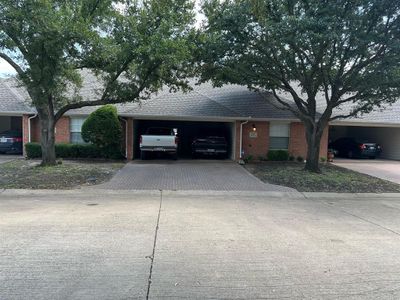 Single story home with a garage | Image 1