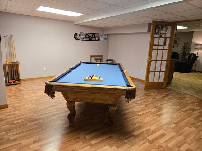 The game room currently houses a pool table but you could do many things with it, including using it as a craft room | Image 23