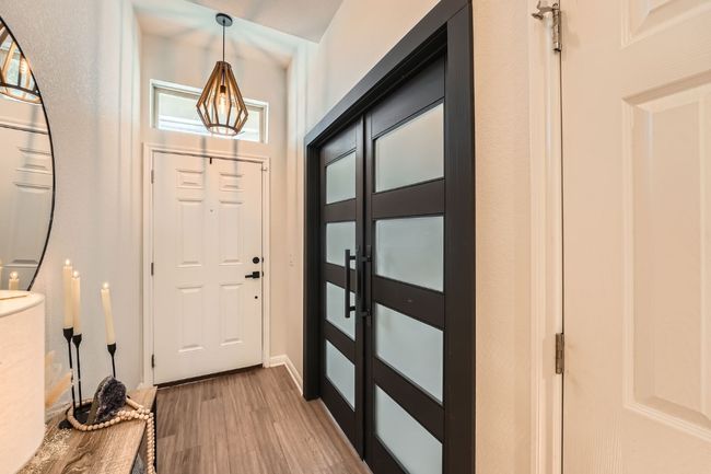 Foyer entrance featuring light wood-style floors | Image 6