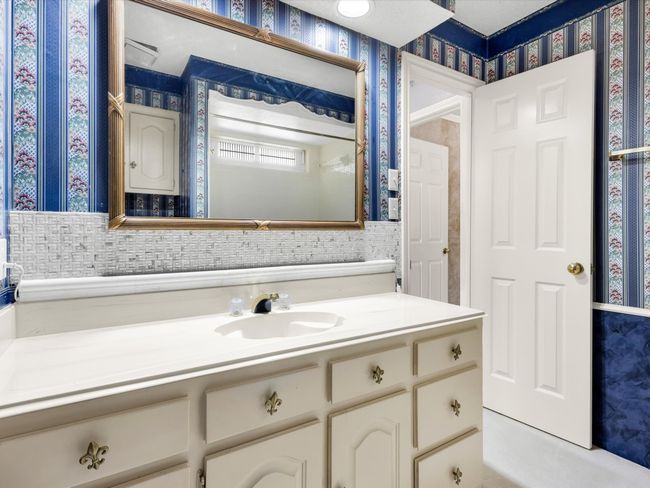 Second full bathroom with vanity and lots of storage space. | Image 31