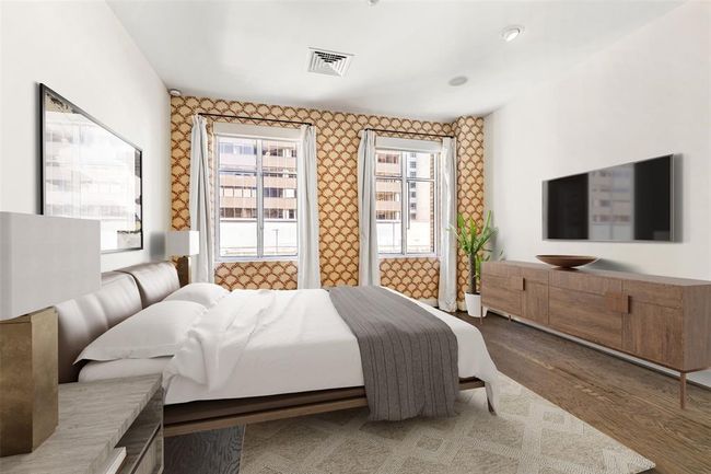 Guest bedroom with wallpaper accent by Sloane Britaine. | Image 16
