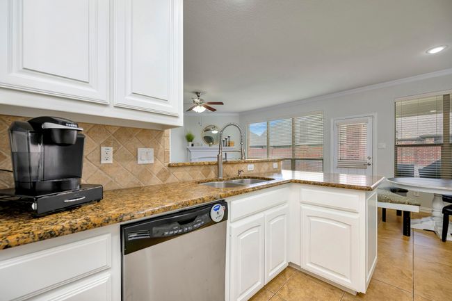 Peninsula counters provide lots of space to serve your family or guests | Image 17