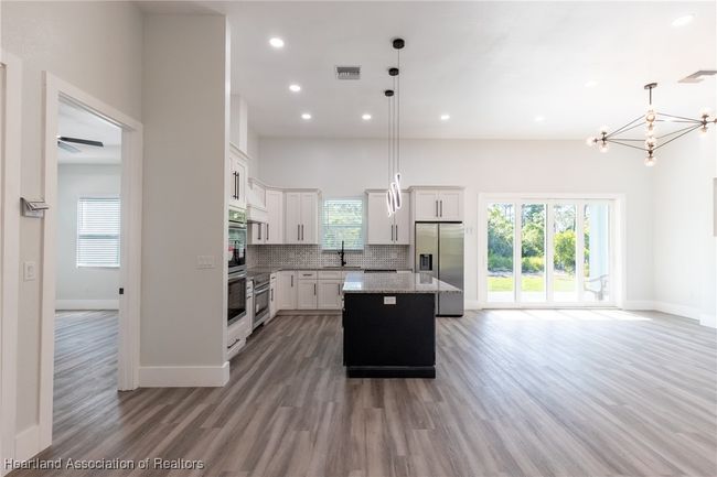 9816 S Orange Blossom Blvd, House other with 3 bedrooms, 2 bathrooms and null parking in Sebring FL | Image 10