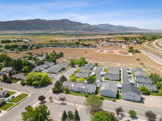 Aerial view of residential area with a mountain backdrop | Image 27