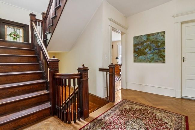 Staircase to 3rd level with stained glass window | Image 31