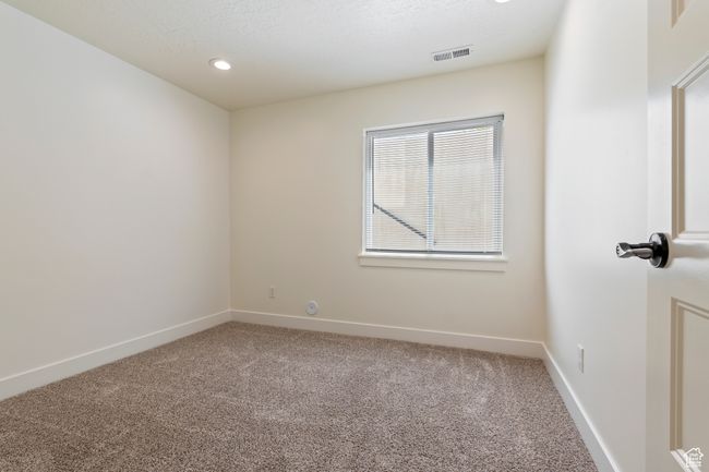 Unfurnished room featuring baseboards, visible vents, recessed lighting, and carpet flooring | Image 29