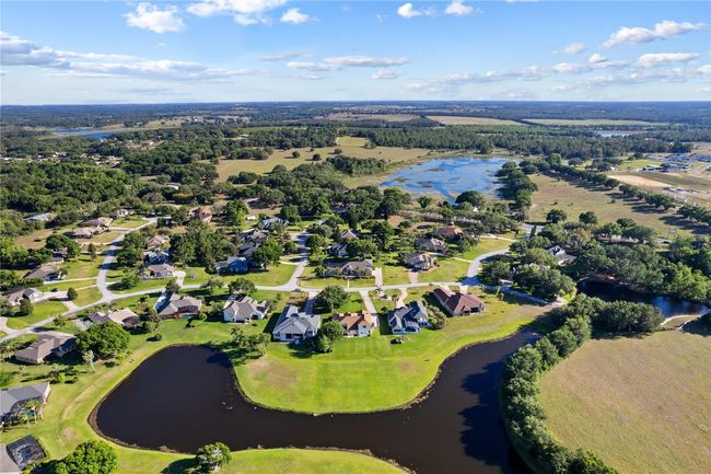 7351 Spring Mountain Ln, House other with 5 bedrooms, 4 bathrooms and null parking in YALAHA FL | Image 72