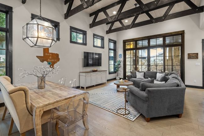OPPEN LVING & DINING AREA WITH HIGH CEILINGS | Image 6