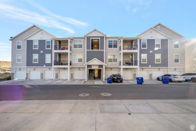 View of building exterior featuring a garage | Image 1