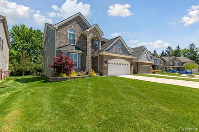 30796 Asbury Hill Drive, Home with 4 bedrooms, 2 bathrooms and null parking in Lyon Twp MI | Image 2