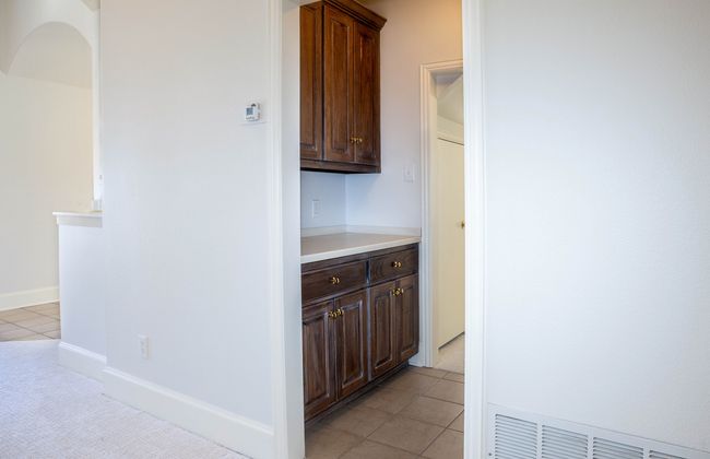 Butler Pantry with light tile patterned flooring and visible vents | Image 19