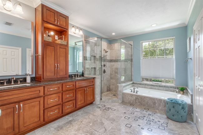 Primary Bathroom featuring jetted tub, a separate shower | Image 19