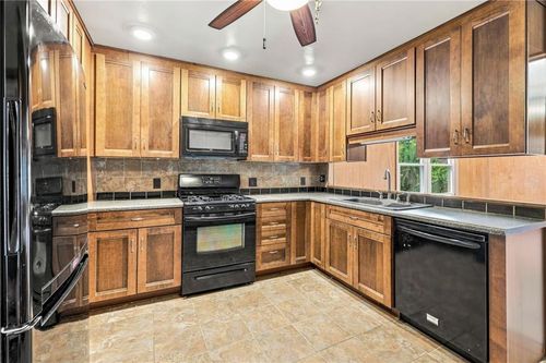9006 E 74th Ter, Raytown, MO, 64133-6433 | Card Image