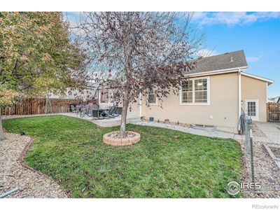 Low maintenance and completely upgraded backyard with brand new concrete patio. | Image 3