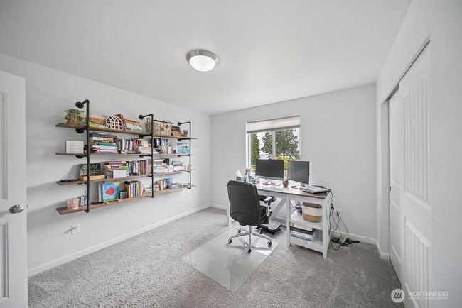 2nd bedroom or office, where you have views of water and mountains. | Image 16