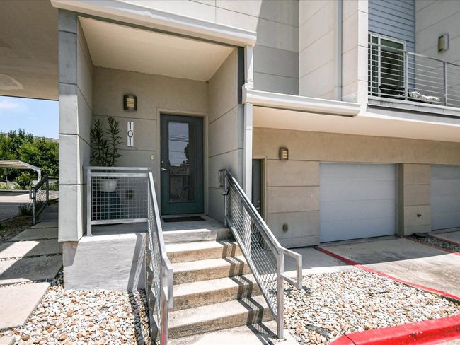 Property entrance with a garage and driveway | Image 5