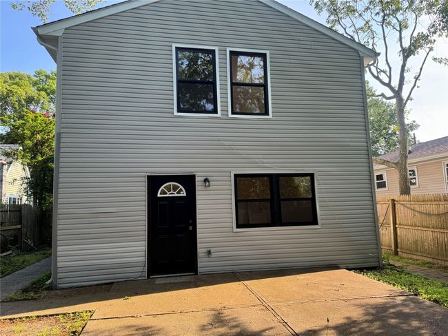 View of rear entrance and patio | Image 12