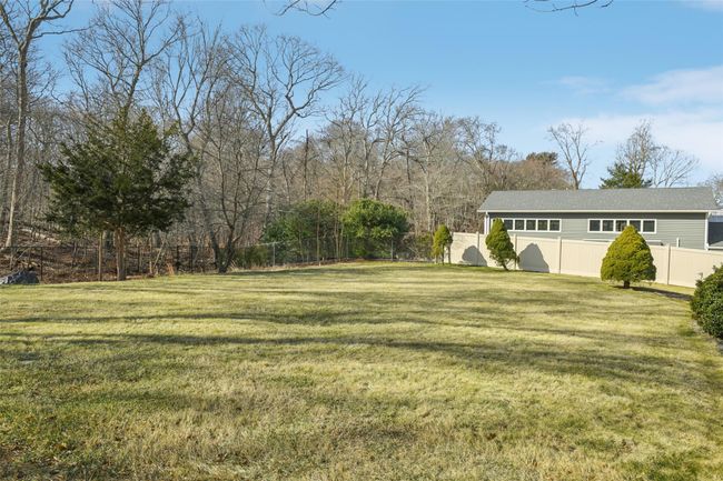 View of yard with a fenced backyard | Image 30