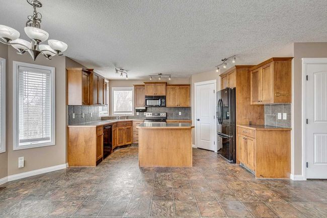 1006 Highland Green Drive Nw, House other with 5 bedrooms, 4 bathrooms and 4 parking in High River AB | Image 10