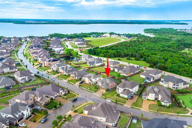 Aerial perspective of suburban area featuring a large body of water | Image 39