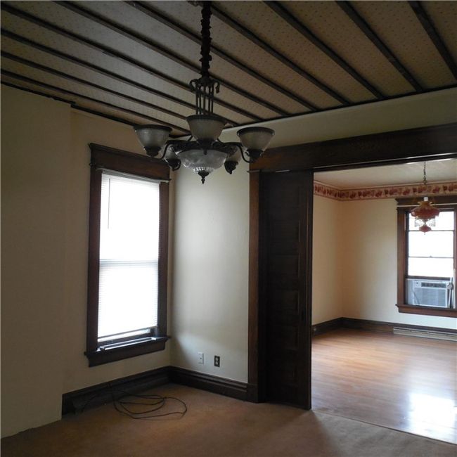 Pockets doors that lead into the dining room | Image 10