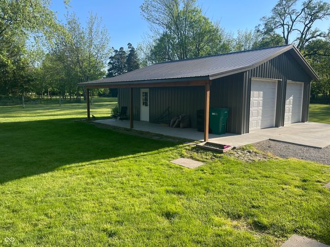 Roof is insulated and porch is off the east side | Image 33