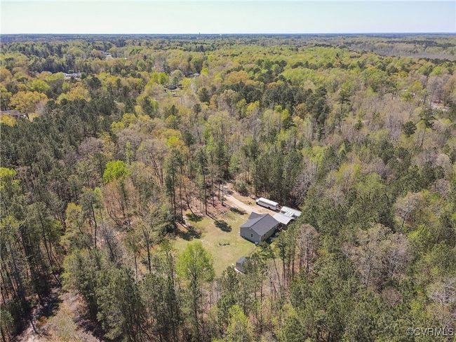 Drone / aerial view featuring a view of trees | Image 50