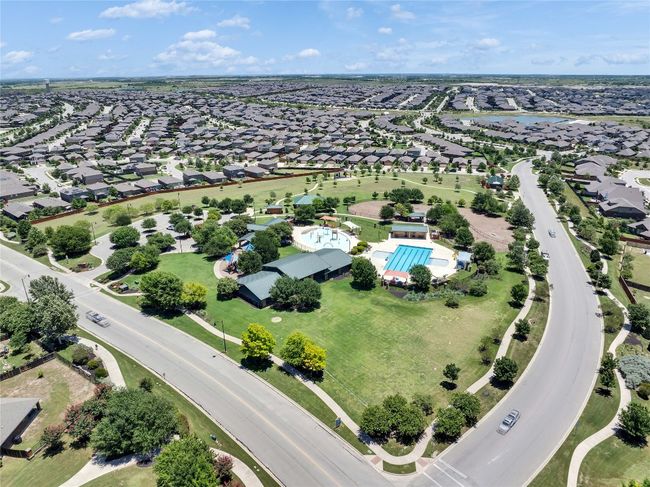 Just a short walk (few minutes) to the pool, splash pad, and playground! | Image 27